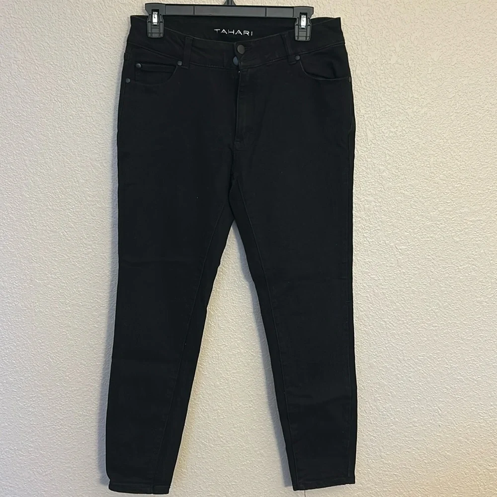 Women’s black skinny jeans size 10.